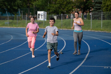 girl runs, runner, teenager, children's sports, runner, family engaged in sports, workout, warm-up, girl runs, woman runs, sports, treadmill, boy runs, happiness, childhood, happy family, funny boy