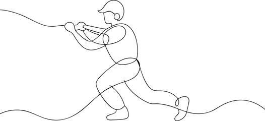 A man is pulling a rope. The rope is long and the man is pulling it with all his strength