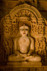 An idol of Lord Mahavir in Jain Temple, Jaisalmer Fort, Jaisalmer, Rajasthan, India, Asia.