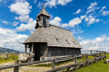 Velika Planina, Kamnik, Slovenia. Lord of the Rings style village. Wooden typical houses, hills,...