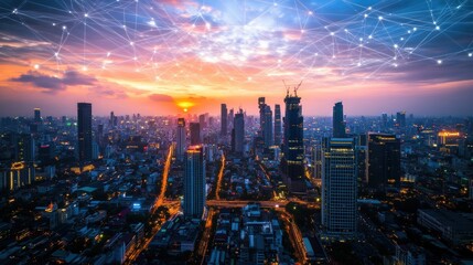 Fototapeta premium digital technology concept, aerial view of cityscape at sunset with network connection lines and global communication