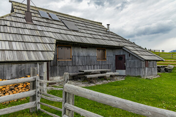 Velika Planina, Kamnik, Slovenia. Lord of the Rings style village. Wooden typical houses, hills,...