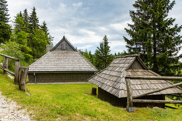 Velika Planina, Kamnik, Slovenia. Lord of the Rings style village. Wooden typical houses, hills,...