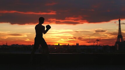 Fototapeta premium Silhouette Boxer Training at Sunset with Eiffel Tower View
