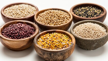 Assorted Dried Legumes and Seeds in Decorative Wooden Bowls on White Background