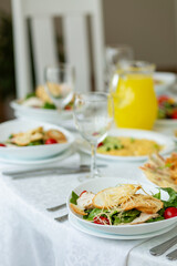 Wedding banquet in restaurant, covered round table for guests