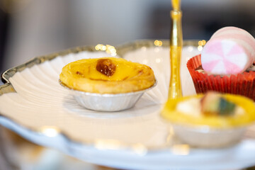 Afternoon tea is a delightful British tradition typically enjoyed between 3:30 and 5:00 PM. It consists of a light meal with a variety of finger foods, served alongside freshly brewed tea. The classic