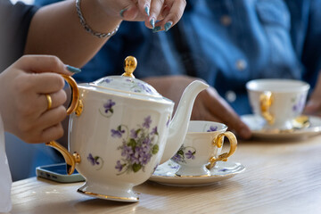 Afternoon tea is a delightful British tradition typically enjoyed between 3:30 and 5:00 PM. It consists of a light meal with a variety of finger foods, served alongside freshly brewed tea. The classic