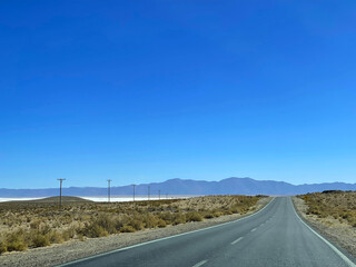 Empty road leading to Salinas Grandes, Jujuy, Argentina
