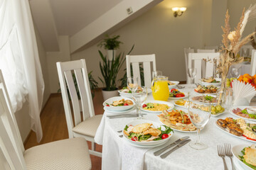 Wedding banquet in restaurant, covered round table for guests