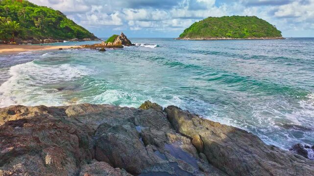 A white wave hits the rock in slow motion.
turquoise sea around Ya Nui beach.
Ya Nui beach is the good place for swimming snorkeling and sea canoe. Separated sea During low tide. white foam splashing