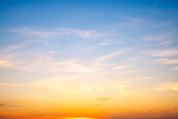Beautiful , luxury soft gradient orange gold clouds and sunlight on the blue sky perfect for the background, take in everning,Twilight, Large size, high definition landscape photo