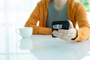 Young woman using smartphone.