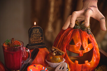 Candles scene with another decor for Halloween party on a table, design for autumn Holidays