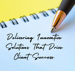 Delivering innovation solutions that drive client success text with close up pen background....