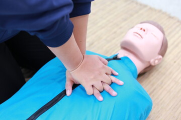 Performing CPR involves chest compressions and rescue breaths to maintain circulation and breathing in a person experiencing cardiac arrest, potentially saving their life until professional medical