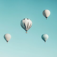 Obraz premium several hot air balloons floating in the clear blue sky