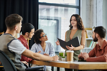 Team members engage in a serious discussion about upcoming time.