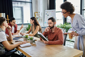 Colleagues share thoughts and support during a difficult conversation.