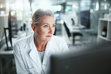 Reading, woman and scientist with computer in laboratory for medical research on cancer drug trial....