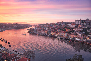 Cloudy sunset view of Dom Luiz bridge, Porto, Portugal