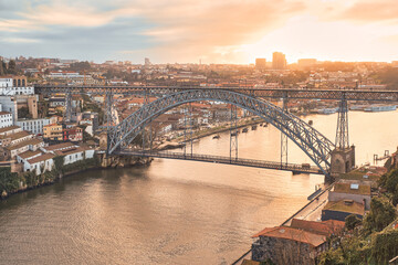 Cloudy sunset view of Dom Luiz bridge, Porto, Portugal