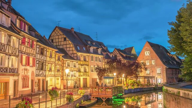 Colmar France time lapse day to night city skyline of Colorful Half Timber House at Ill River