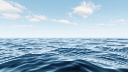 Obraz premium A serene ocean view with gentle waves, reflecting a clear blue sky and sparse clouds, creating a peaceful atmosphere