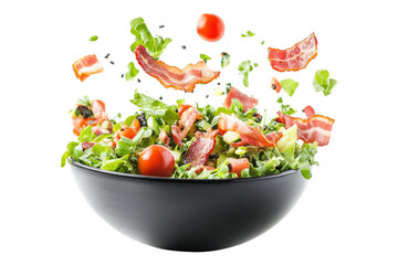 Vegetables fall into a black frying pan on a transparent background. Healthy food concept