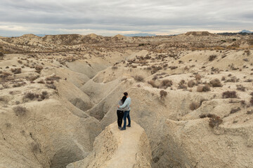Aerial view of a couple in the Abanilla desert or Mahoya desert in Murcia, Spain