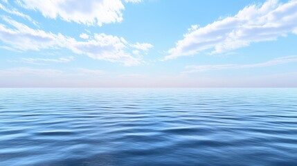 Obraz premium A serene ocean view with gentle waves, reflecting a clear blue sky and sparse clouds, creating a peaceful atmosphere