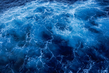 Natural blue waters with white caps. View from a ship. Ocean water.