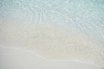View of the sand and water on Nassau, Bahamas island. Natural background.