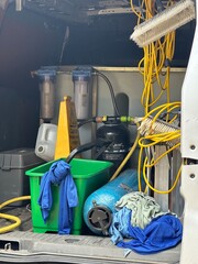 window cleaning equipment in the back of a van 