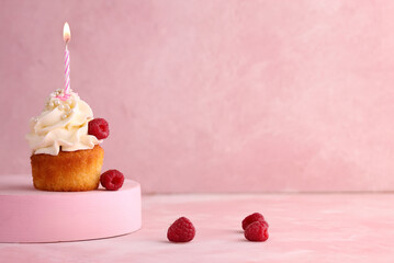 cupcake for birthday with berries and cream