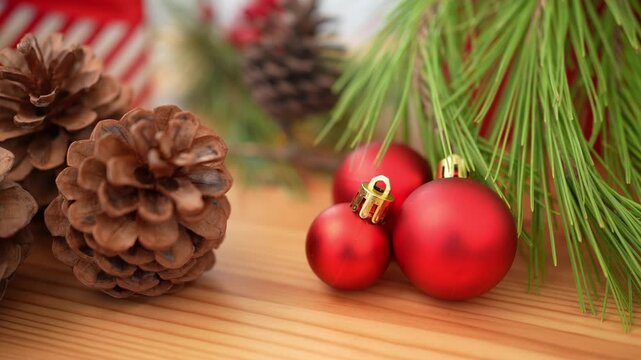 A splendidly adorned Christmas ball on rustic wooden table, lending its decorative brilliance to the holiday background. Scene of merriment for a joyous Christmas celebration. 