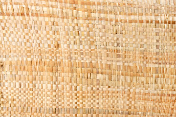 Weavered bast cloth on manual loom. Top view.