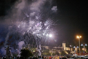 Fireworks Display at Fiesta de la Anunciada in Bayona with Parador Backdrop