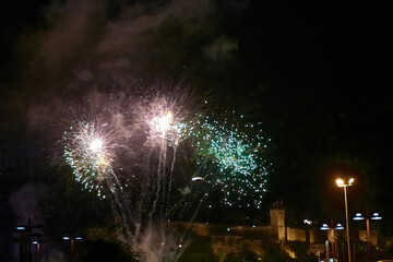 Fireworks Display at Fiesta de la Anunciada in Bayona with Parador Backdrop