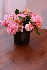 bouquet of pink roses, table arrangement, birthday party, wedding party, social event, flower decoration, table decoration, corner table with flowers
