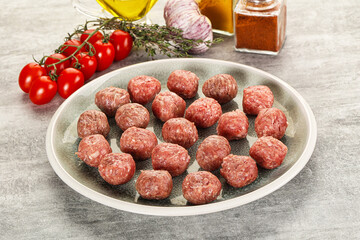 Uncooked raw beef meatball minced