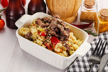 Traditional couscous with beef and vegetables