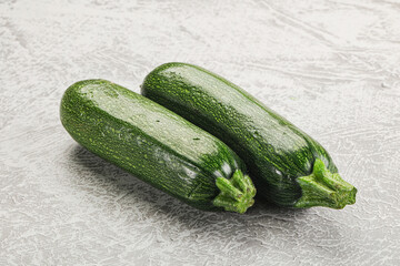 Raw green ripe zucchini vegetable