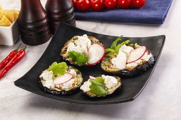 Grilled eggplant with cheese and radish