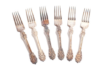 collection of old silver forks