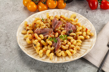 Italian pasta cellentani with anchovy