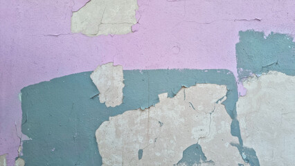 Peeling paint on an old wall. Grunge background for design