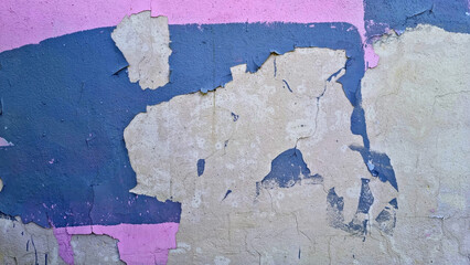 Peeling paint on an old wall. Grunge background for design