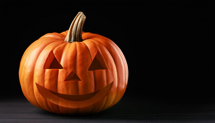 Illuminated Halloween Jack-o'-Lantern Pumpkin with a Menacing Grin on a Dark Background, Capturing the Spooky and Eerie Atmosphere of the Holiday Night