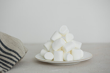 Heap of white marshmallows, isolated on white background